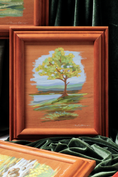 Load image into Gallery viewer, framed acrylic original painting on handmade panel featuring a single tree on a rolling hill with a small pond and the blue ridge mountains in the background. Raw edges. Painterly original by meredith raiford akins