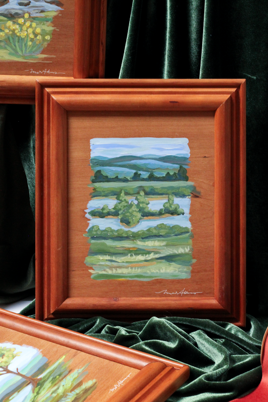 custom framed wood panel original painting by meredith raiford akins of an island in the middle of a river with the blue ridge mountains in the background